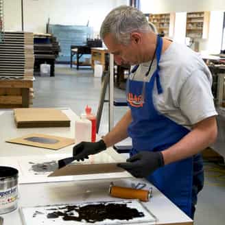 Christopher Wool working in the studio on monoprints.