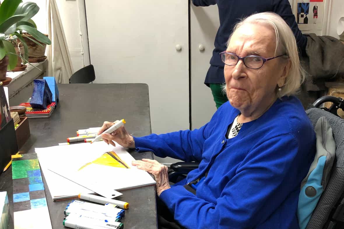 Artist Carmen Herrera working in her home studio.